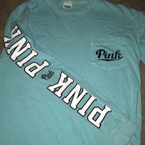 Long sleeve teal pink shirt.